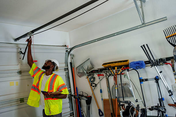 Professional Garage Door Panel Replacement technician working in Scott County County, MS